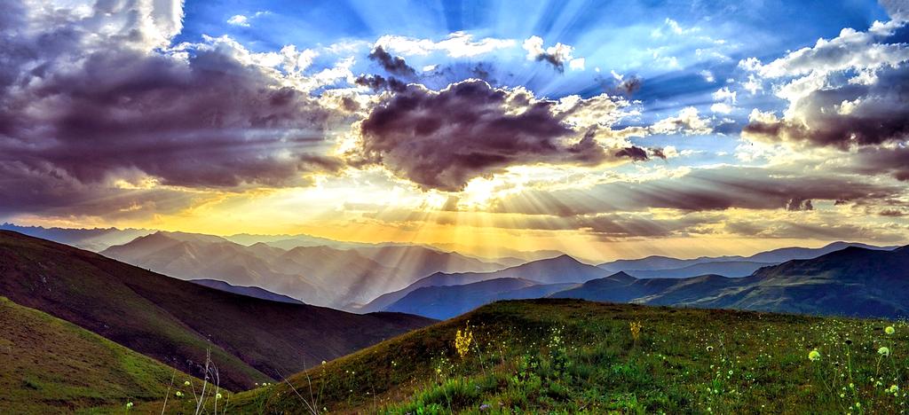 Teenagers hiking mountain trail with scenic views